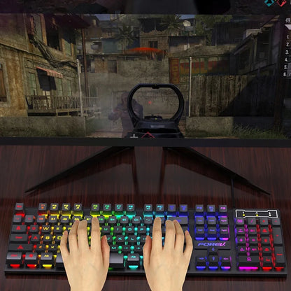 Teclado gamer de 104 teclas con luz RGB, tacto mecánico y resistente al agua