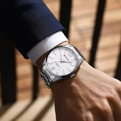 Reloj de hombre en acero con luz nocturna, estilo elegante